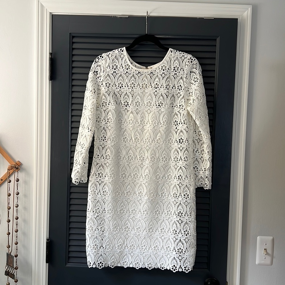 This is a Club Monaco white lace dress, size 6.